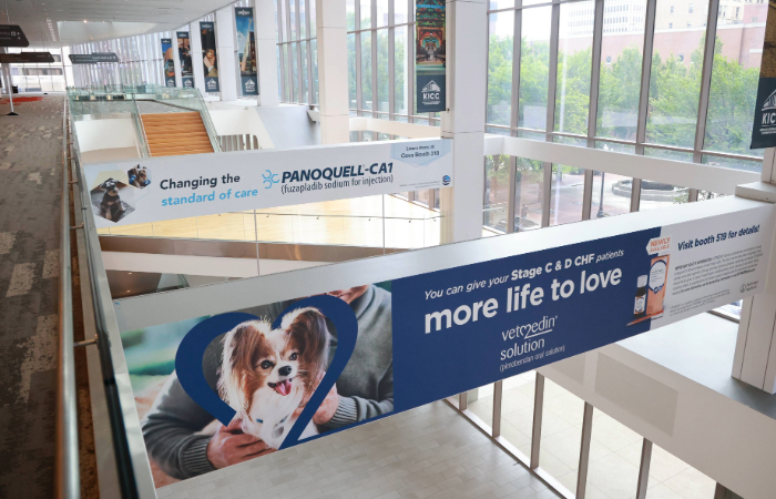 Two advertising banners in the Kentucky International Convention Center