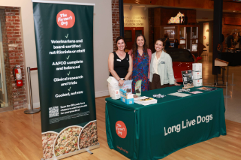 Three representatives from The Farmer's Dog at a table